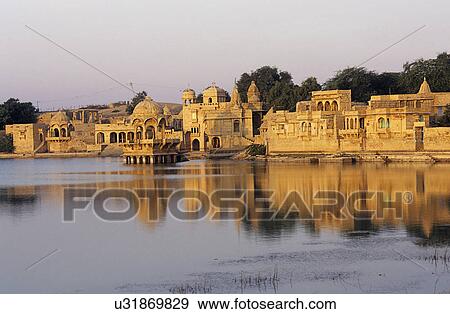 Gadi Sagar Tank at dusk View Large Photo Image Stock Photo - Gadi Sagar Tank at dusk. Fotosearch