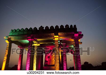 Giant monolithic Ganesha statue brightly lit View Large Photo Image Stock Image - Giant monolithic Ganesha statue brightly lit . Fotosearch