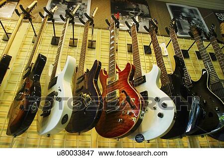 Guitars on display View Large Photo Image Stock Photo - Guitars on display . Fotosearch