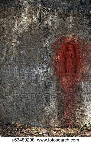 Hindu deity Hanuman carved on a boulder  View Large Photo Image Stock Photo - Hindu deity Hanuman carved on a boulder . Fotosearch