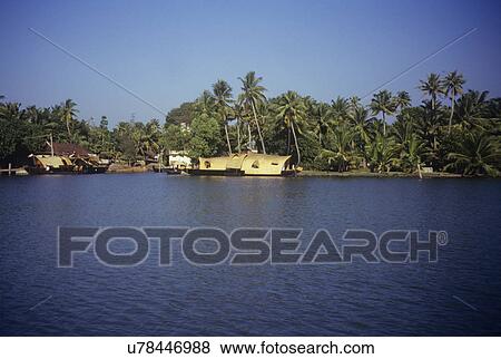 Houseboats on the Backwaters of Kerala View Large Photo Image Stock Photo - Houseboats on the Backwaters of Kerala. Fotosearch