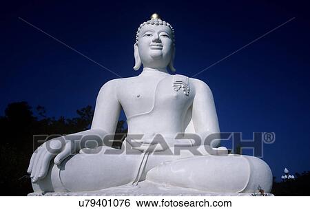 Huge seated Buddha statue View Large Photo Image Stock Photograph - Huge seated Buddha statue. Fotosearch