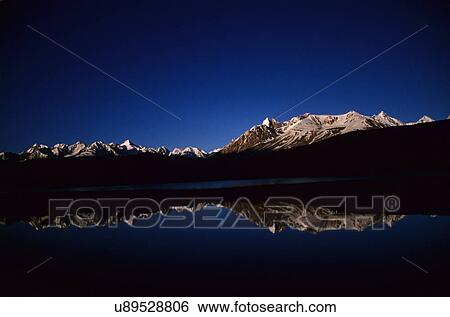 Reflection of mountain in Chandertal View Large Photo Image Stock Photograph - Reflection of mountain in Chandertal. Fotosearch