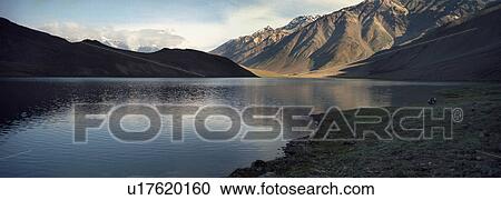 Stock Image - Reflection of mountains. Fotosearch
