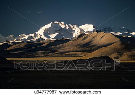 Stock Photo - Snow clad mountain peaks. Fotosearch