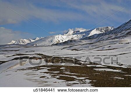 Snow covered mountain View Large Photo Image Stock Image - Snow covered mountain. Fotosearch