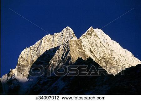 Snow covered peak View Large Photo Image Stock Image - Snow covered peak. Fotosearch