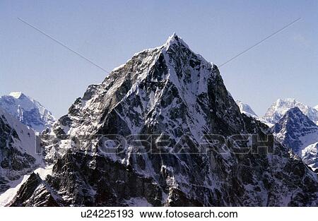 Snowy mountain cliff View Large Photo Image Stock Image - Snowy mountain cliff. Fotosearch