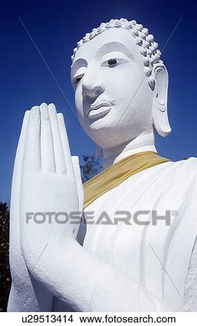 Statue of Buddha praying View Large Photo Image Picture - Statue of Buddha praying. Fotosearch