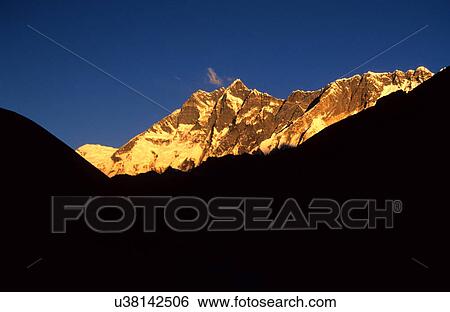 Sunlight on the mountains View Large Photo Image Stock Photograph - Sunlight on the mountains. Fotosearch