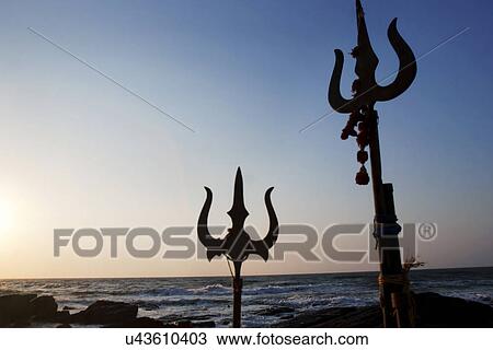 Trishuls placed at Vagator Beach View Large Photo Image Stock Image - Trishuls placed at Vagator Beach . Fotosearch