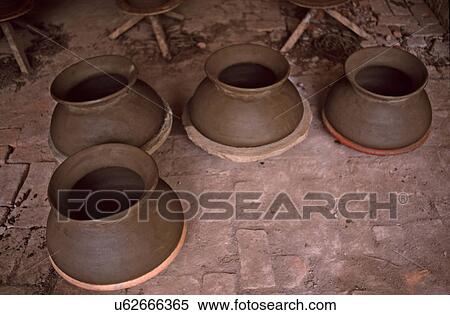 Unbaked Clay pots View Large Photo Image Stock Photography - Unbaked Clay pots. Fotosearch