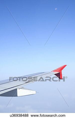 Stock Photo - Wing of a plane. Fotosearch