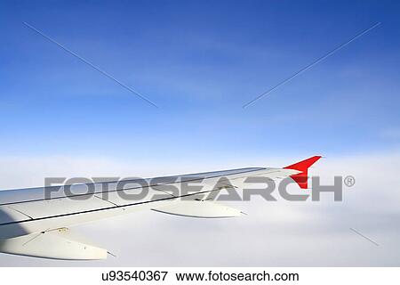 Wing of a plane View Large Photo Image Stock Photo - Wing of a plane. Fotosearch