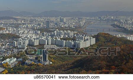 Stock Image - Aerial view of Seoul South Korea Skyline Asia - view from Seoul Tower hilltop. Fotosearch
