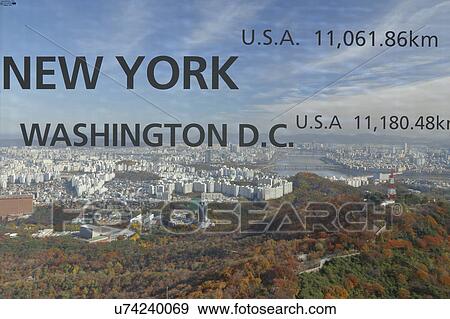 Aerial view of Seoul South Korea Skyline Asia - view from Seoul Tower hilltop - window show's distance to New York, Washington D. C. View Large Photo Image Stock Photo - Aerial view of Seoul South Korea Skyline Asia - view from Seoul Tower hilltop - window show's distance to New York, Washington D. C.. Fotosearch