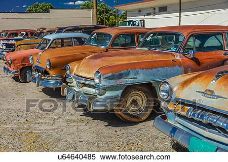 Stock Photography - Antique Rusty Cars in a lot, Montrose Colorado. Fotosearch