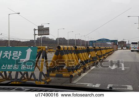 Armed barrier separating South from North Korea - Asia View Large Photo Image Stock Photograph - Armed barrier separating South from North Korea - Asia. Fotosearch