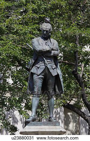 Stock Image - Beaumarchais, bronze statue, Paris. Fotosearch