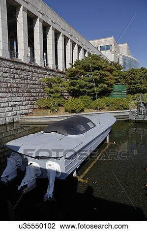Boat featured in War Memorial of Korea, Jeonjaeng ginyeomgwan, Yongsan-dong, Seoul, South Korea View Large Photo Image Stock Image - Boat featured in War Memorial of Korea, Jeonjaeng ginyeomgwan, Yongsan-dong, Seoul, South Korea. Fotosearch