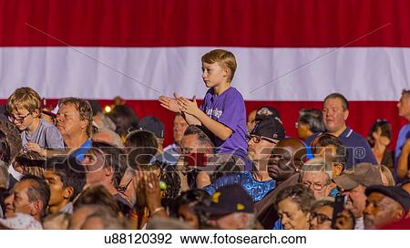 Stock Image - Boy Claps for Hillary Clinton in Las Vegas, October 12, 2016. Fotosearch