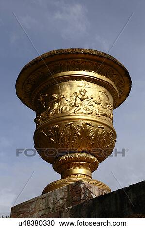 Stock Image -  Chateau de Versailles and Vase at the estate of Versaille was the home and court of Louis XIV, France. Fotosearch