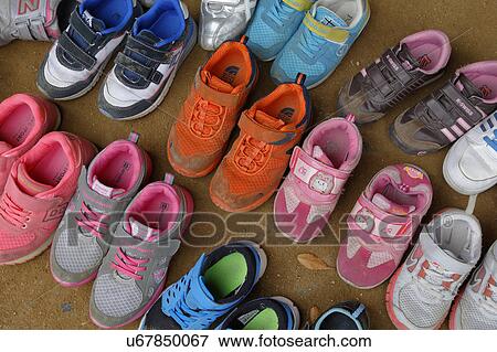 Childrens shoes removed at front door at Namsangol traditional folk village, Seoul, South Korea View Large Photo Image Stock Photo - Childrens shoes removed at front door at Namsangol traditional folk village, Seoul, South Korea. Fotosearch