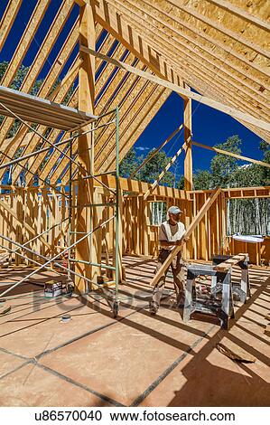 Stock Image - Construction of a "A" Frame House owned by photographer Joe Sohm, Ridgway, Colorado. Fotosearch
