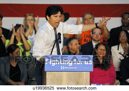 Stock Photography - District Councilman Jose Huizar introduces Former Secretary Hillary Clinton Campaigns for President at East Los Angeles College Cinco de Mayo, 2016. Fotosearch