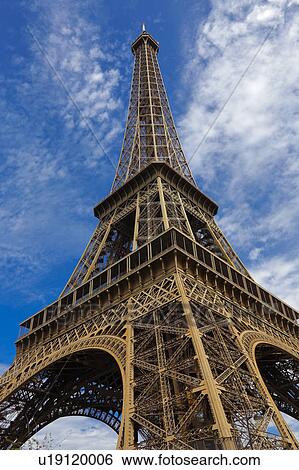 Eiffel Tower & blue sky with clouds, Paris, France View Large Photo Image Stock Photograph - Eiffel Tower & blue sky with clouds, Paris, France. Fotosearch