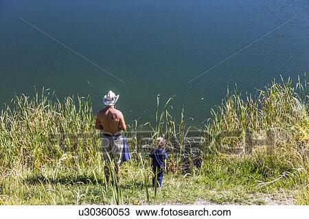 Father and son are fishing South of Montrose Colorado, off the Uncompahgre, on Chipeta Lakes, Montrose, Colorado View Large Photo Image Stock Image - Father and son are fishing South of Montrose Colorado, off the Uncompahgre, on Chipeta Lakes, Montrose, Colorado. Fotosearch
