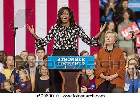 Stock Image - First Lady Michelle Obama introduces Hilllary Clinton at a presidential campaign event in North Carolina. Fotosearch