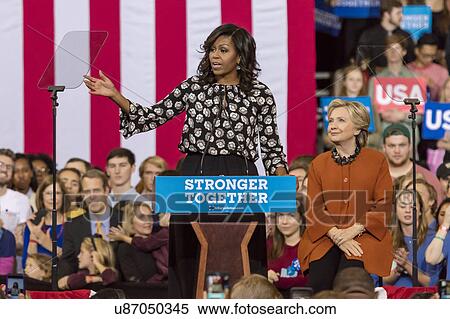 Stock Photography - First Lady Michelle Obama introduces Hilllary Clinton at a presidential campaign event in North Carolina. Fotosearch