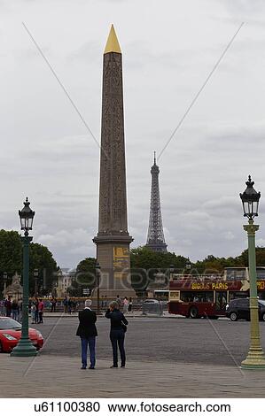 Stock Image - France, Paris, Obelisk and Eiffel Tower, Place de la Concorde. Fotosearch