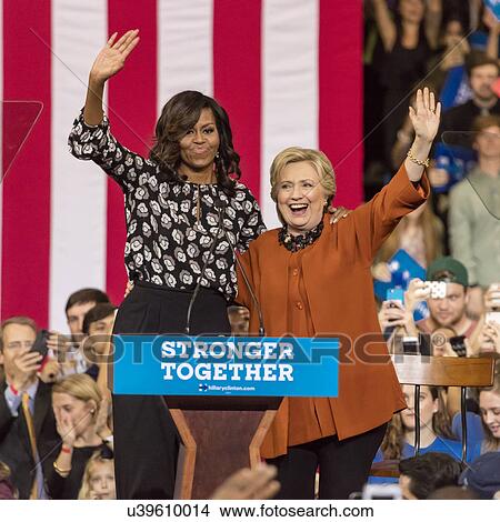 Hillary Clinton and US First Lady Michelle Obama appear at a presidential campaign event in North Carolina View Large Photo Image Picture - Hillary Clinton and US First Lady Michelle Obama appear at a presidential campaign event in North Carolina. Fotosearch
