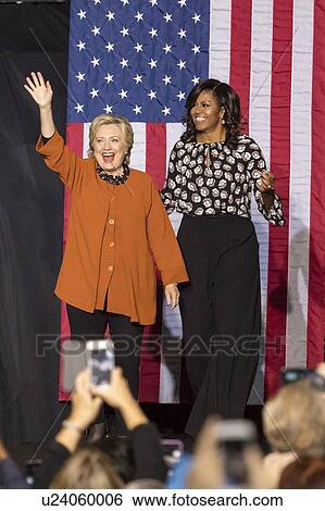 Stock Photograph - Hillary Clinton and US First Lady Michelle Obama appear at a presidential campaign event in North Carolina. Fotosearch