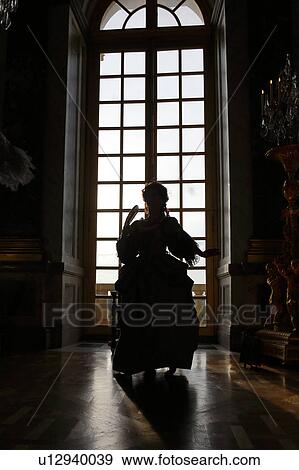 Stock Photo - Historical reenactors at the Chateau de Versailles, the estate of Versaille was the home and court of Louis XIV, France. Fotosearch