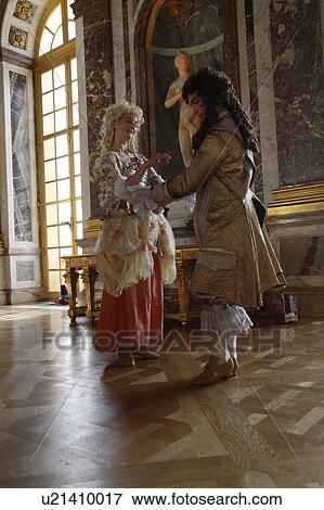 Stock Photo - Historical reenactors at the Chateau de Versailles, the estate of Versaille was the home and court of Louis XIV, France. Fotosearch