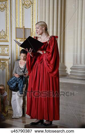 Stock Photo - Historical reenactors at the Chateau de Versailles, the estate of Versaille was the home and court of Louis XIV, France. Fotosearch