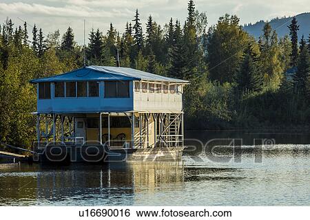Stock Photograph - Houseboat on Chena River, Fairbanks Alaska . Fotosearch