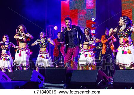 Indian pop star Prabhu Deva and dancers perform at Donald Trump Bollywood rally at Edison New Jersey View Large Photo Image Stock Photo - Indian pop star Prabhu Deva and dancers perform at Donald Trump Bollywood rally at Edison New Jersey. Fotosearch