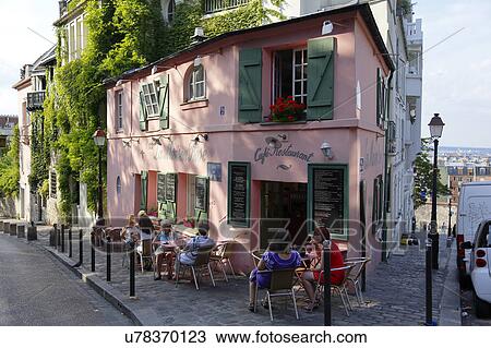 Stock Image - La Maison, Rose French Cafe - Rue de l'Abreuvoir, Paris France. Fotosearch