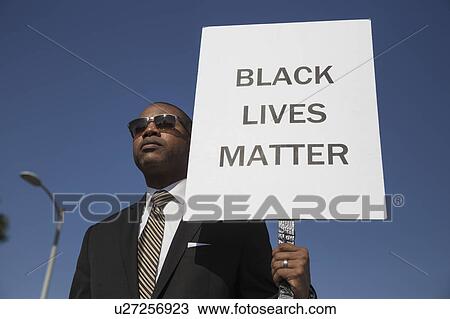 Los Angeles, California, USA, January 19, 2015, 30th annual Martin Luther King Jr. Kingdom Day Parade, black man hold sign Black Lives Matter View Large Photo Image Stock Image - Los Angeles, California, USA, January 19, 2015, 30th annual Martin Luther King Jr. Kingdom Day Parade, black man hold sign Black Lives Matter. Fotosearch