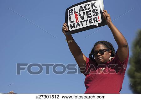 Stock Image - Los Angeles, California, USA, January 19, 2015, 30th annual Martin Luther King Jr. Kingdom Day Parade, Black Lives Matter sign. Fotosearch