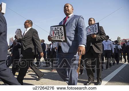 Los Angeles, California, USA, January 19, 2015, 30th annual Martin Luther King Jr. Kingdom Day Parade, men hold signs Black Lives Matter View Large Photo Image Stock Photograph - Los Angeles, California, USA, January 19, 2015, 30th annual Martin Luther King Jr. Kingdom Day Parade, men hold signs Black Lives Matter. Fotosearch