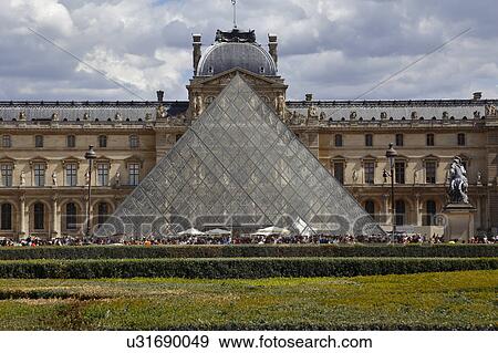 Stock Photo - Louvre Museum, The Great Pyramid at sunset, Paris France. Fotosearch