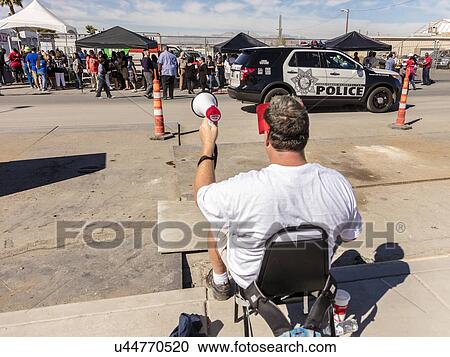 Stock Image - Man protests against Hillary Clinton at the Culinary Union, Las Vegas, Nevada. Fotosearch