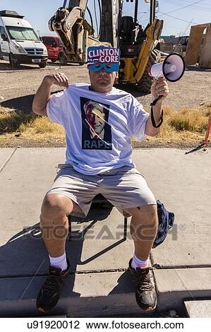 Man protests against Hillary Clinton at the Culinary Union, Las Vegas, Nevada View Large Photo Image Stock Image - Man protests against Hillary Clinton at the Culinary Union, Las Vegas, Nevada. Fotosearch