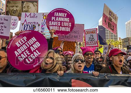 Stock Image - Massive Crowds for Women's March Protesting Donald J. Trump. Fotosearch