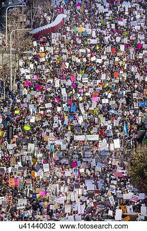 Stock Image - Massive Crowds for Women's March Protesting Donald J. Trump. Fotosearch